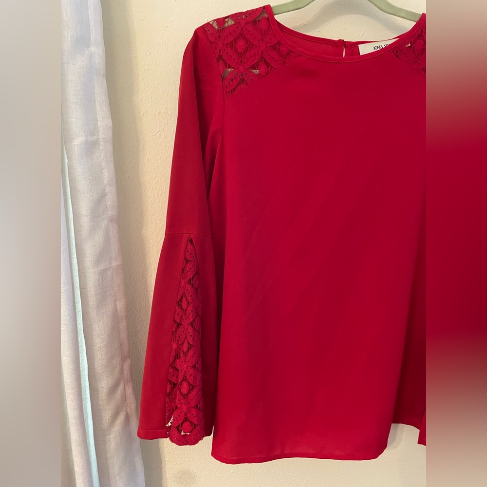Women’s red lace blouse